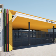 Foto renderizada da fachada de uma escola. Há um totem onde se lê Escola Estadual e um pórtico onde se lê Breno Garcia.