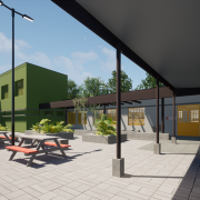 Imagem gerada por computador mostra o pátio de uma escola com um prédio térreo ao fundo.